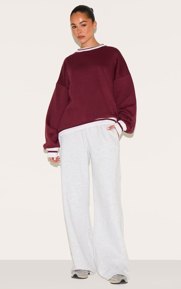 7f740da5f6407272b88cf5475bccd228123404b7_CNL4111_3_burgundy_striped_ribbed_hem_oversized_sweatshirt-1