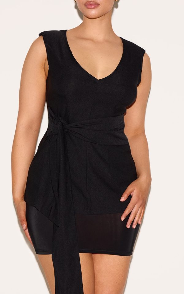 80e50d2d6595d6246790f37181c10a7aeee1139d_CNM3022_4_shape_black_stretch_woven_plunge_front_belted_long_line_top