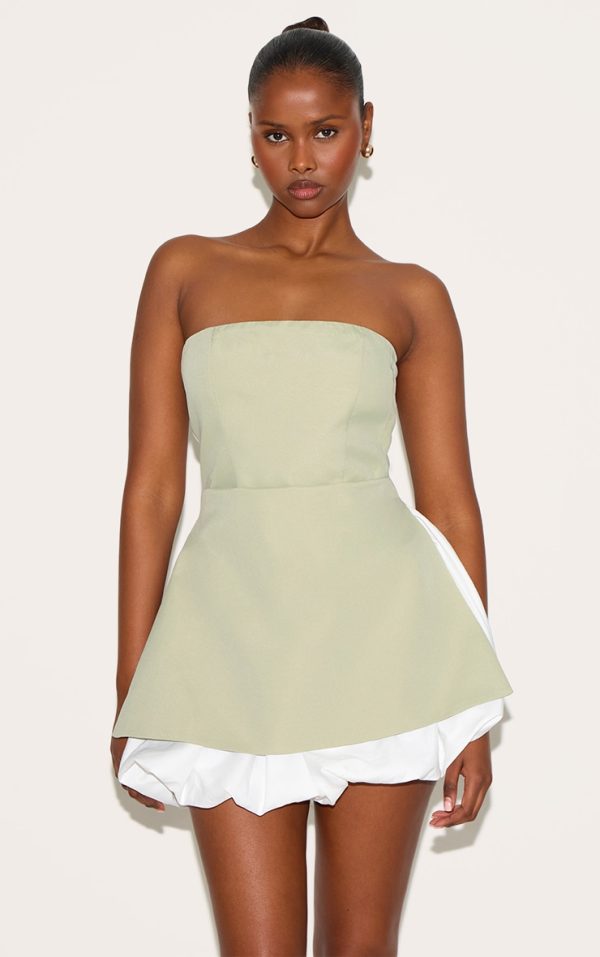 8178e8d815f13f22e5fdc6012d375f73562f027b_CNL9038_1_sage_green_tailored_bandeau_puffball_hem_shift_dress