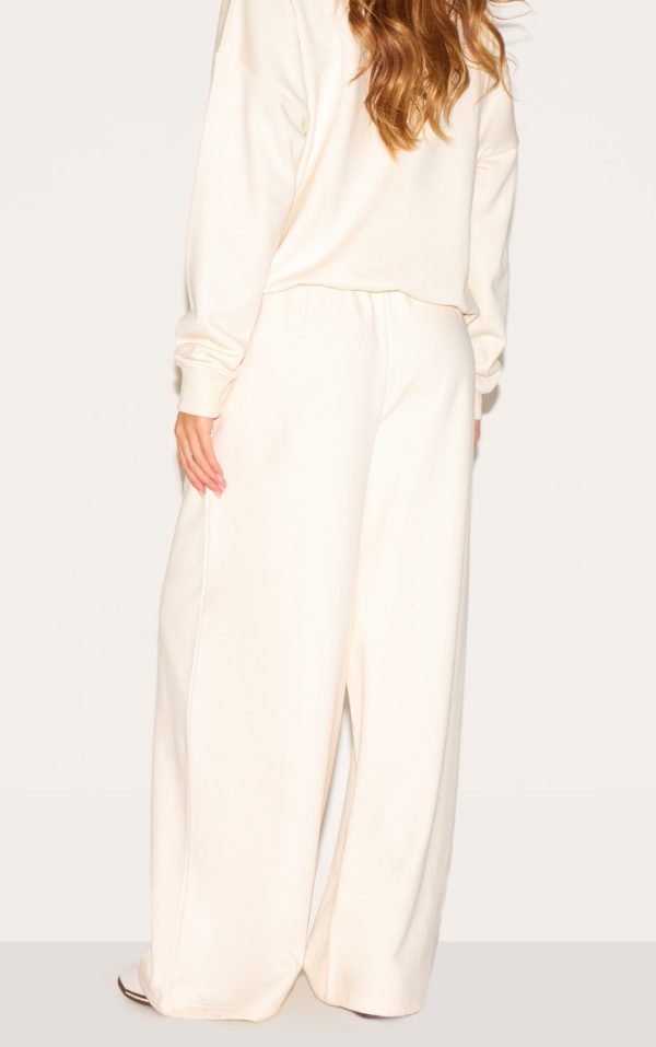 81935fa9819d8d8865f850f51ef1c00b8468a893_CNM4683_3_cream_run_club_puff_print_wide_leg_joggers