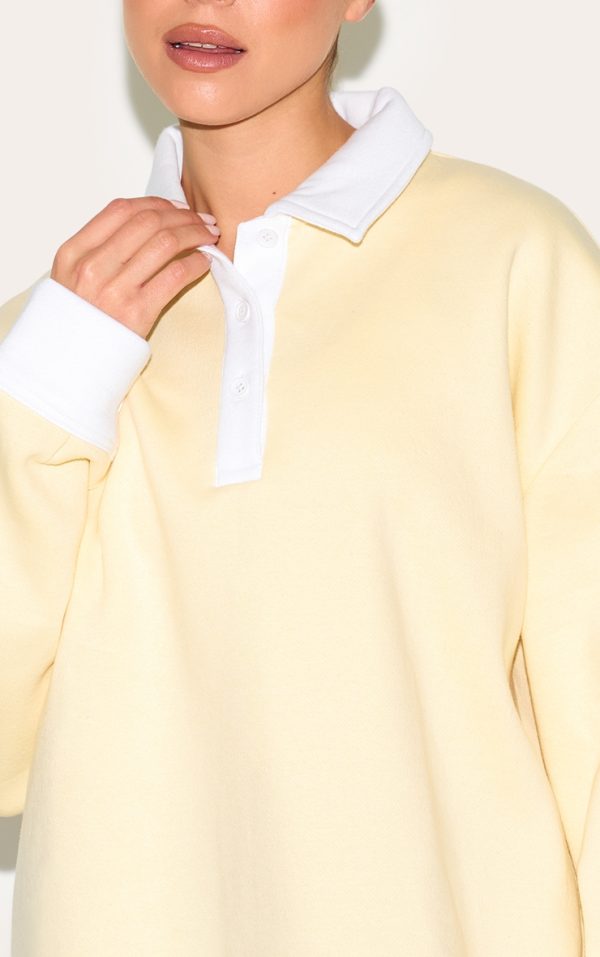 820404c55cc5b89fe30b7edb9c0861cc30aaceca_CNM6498_4_butter_yellow_oversized_polo_sweatshirt