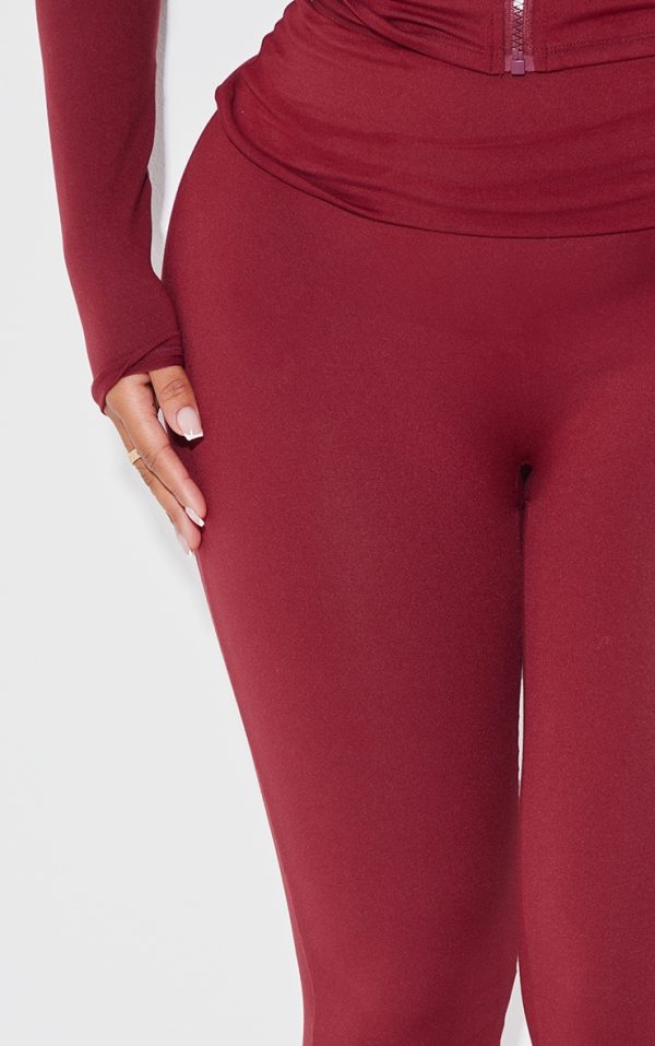 820cfb4bd28a6242b380ccc22cc8f90821f81a3c_CNK0782_4_shape_burgundy_sculpted_foldover_waist_flare_trousers