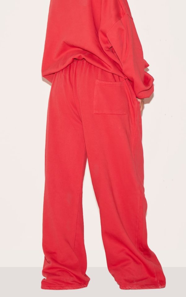 8298e8d85040708fefe92d48ca4a89a86750ada2_CNM6347_3_plus_red_prettylittlething_red_embroidered_straight_leg_joggers