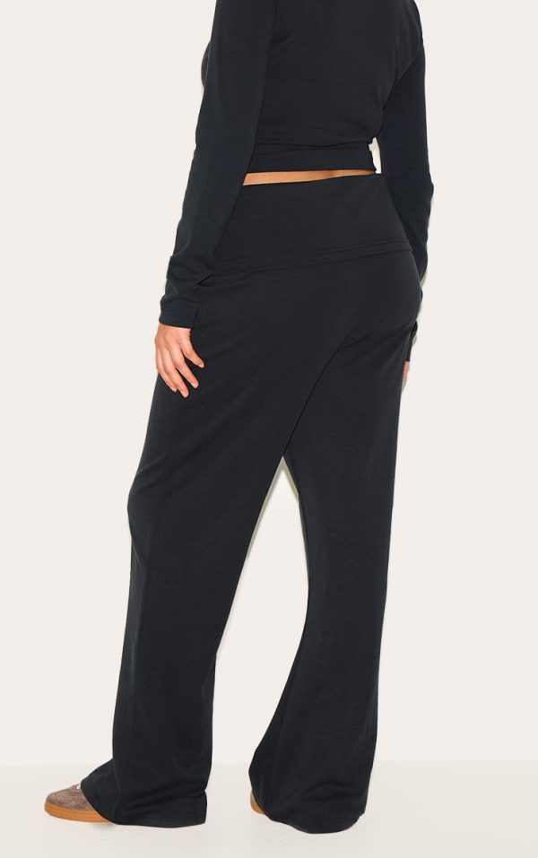 82a9139804accc831f09b219b24cba3dd8ad7f85_CNM2771_3_plus_black_modal_fold_over_flares