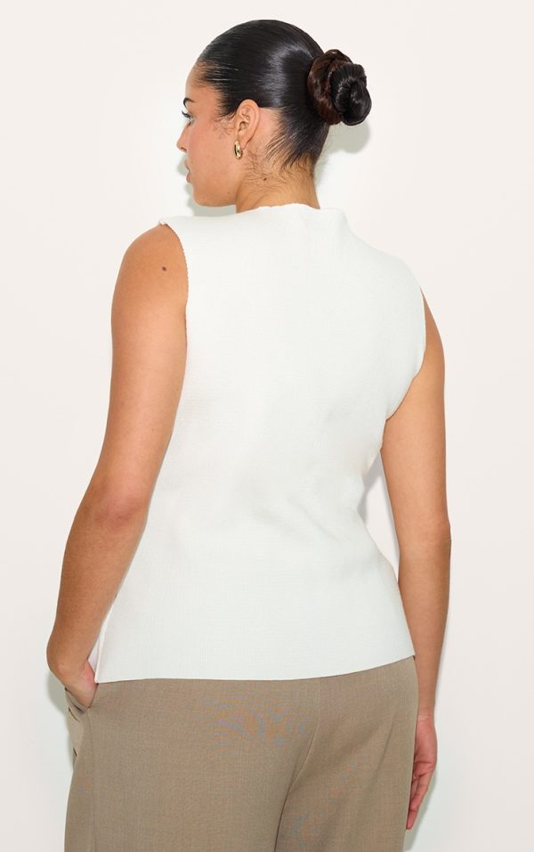 82c02ef5ec03ee6b18144a394661a93ce9af3017_CNM7735_2_plus_cream_compact_knit_button_up_waistcoat
