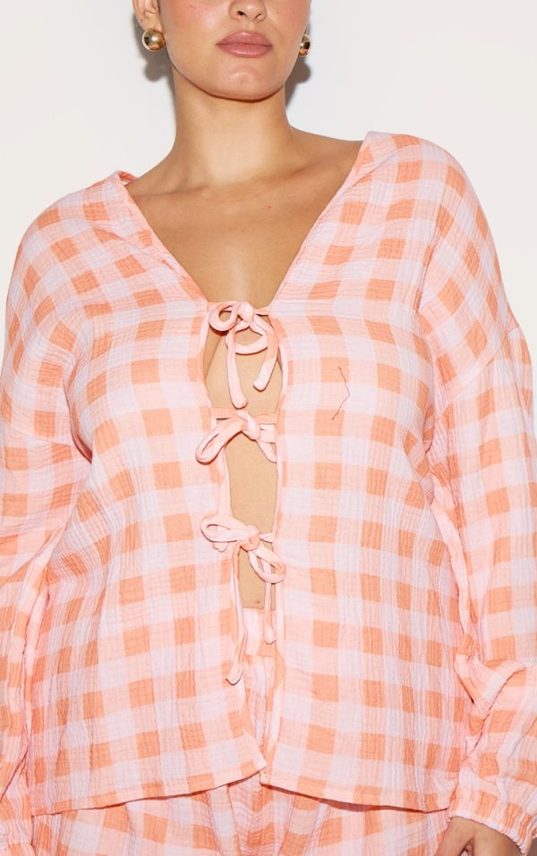 83349095eec0541ea2c1e74b78fade11dc2c2c1a_CNM3360_4_plus_orange_checked_cheesecloth_tie_front_long_sleeve_shirt