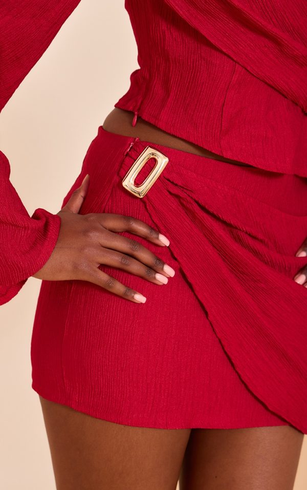 83d1d4d151a701de9fa76b34a032bffda88ff001_CNM8801_5_tomato_red_textured_mid_rise_mini_skirt
