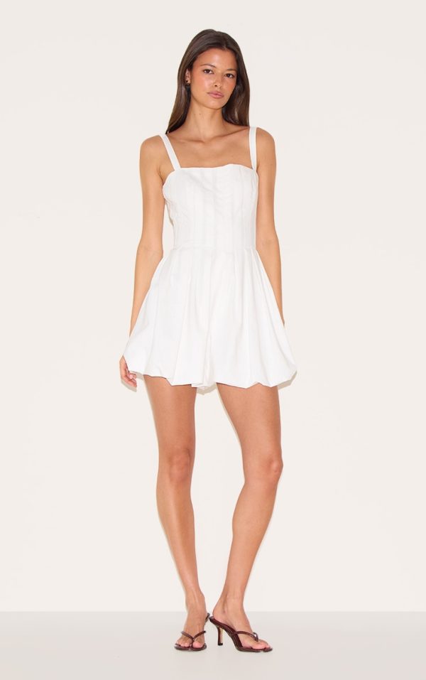 83f37e7da4bb477311fb61628eff5c02eb687673_CNL9243_3_white_twill_pleated_puffball_playsuit
