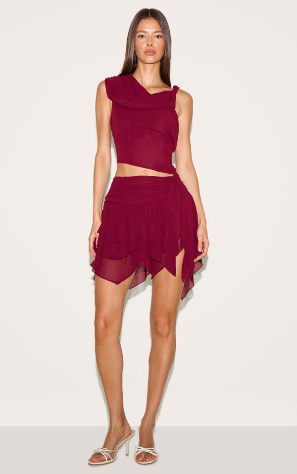 8644243c813ea51e3eb6bae8ee13f79052ab9e88_CNM6167_3_wine_drape_detail_asymmetric_chiffon_top