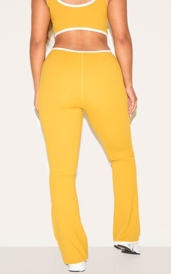 868b89a6f31f0d767334d5f9146f67f81e4487f1_CNM6437_3_shape_olive_sculpt_active_contrast_binding_flare_trousers