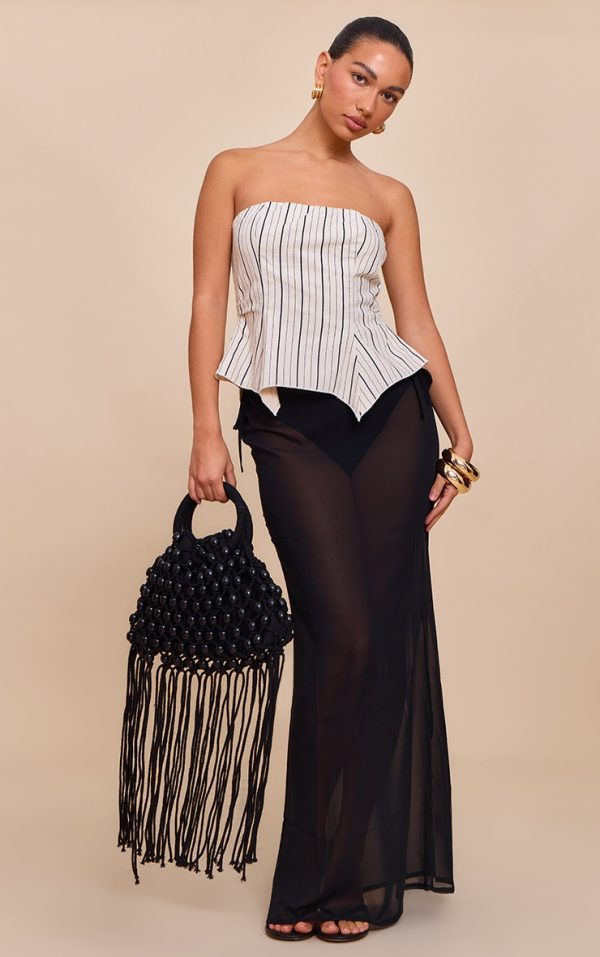 86e65d94d82f04a5d901c7e7a1673fe2203748e0_CNM8224_1_black_sheer_low_rise_maxi_skirt