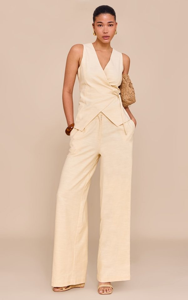 8725580b966cdb41568d8ed856ca8087dbfc1e5c_CNM6318_1_almond_textured_pleat_mid_rise_wide_leg_trousers