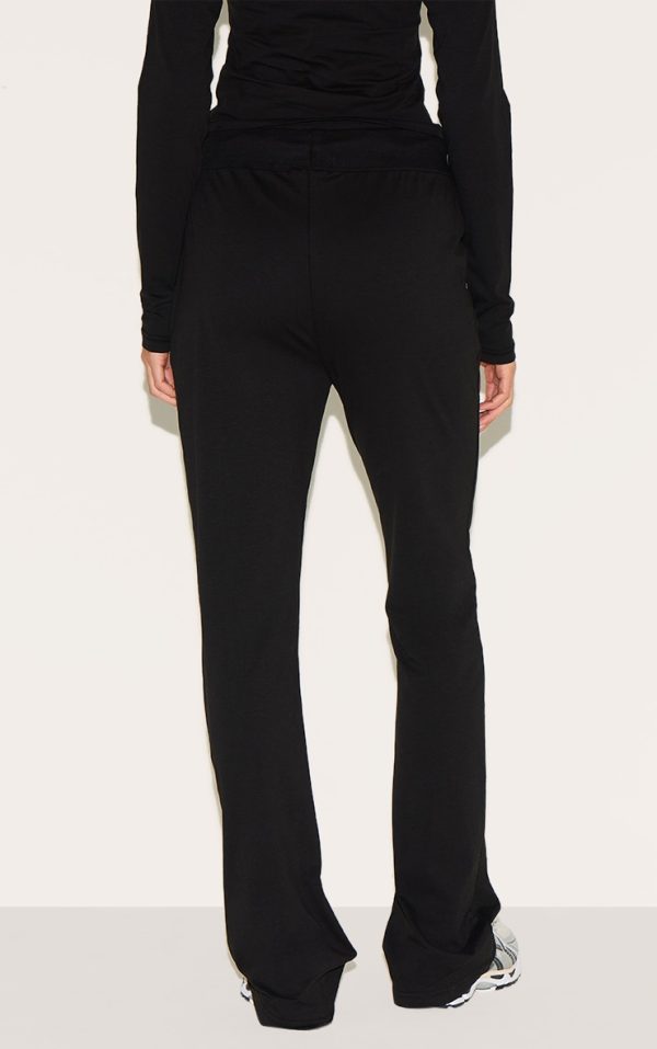 873d7f82c47b500a3a4f30d12da00aa8593a07cc_CNM2916_3_black_cotton_seam_detail_mid_rise_skinny_flares