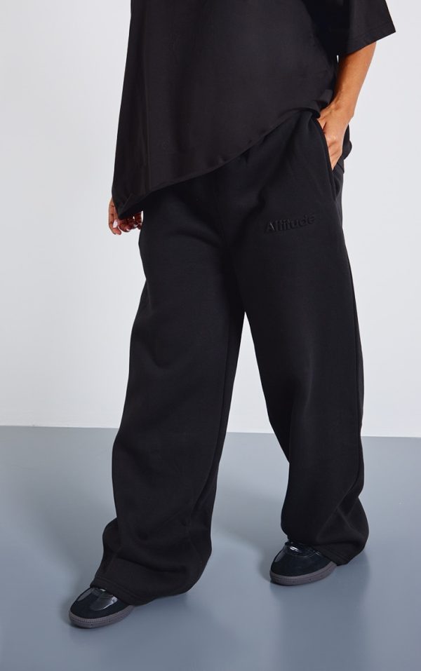 88130352ec823ece9c20e328c6403d72da92fbda_CNJ6915_2_petite_black_embossed_wide_leg_jogger