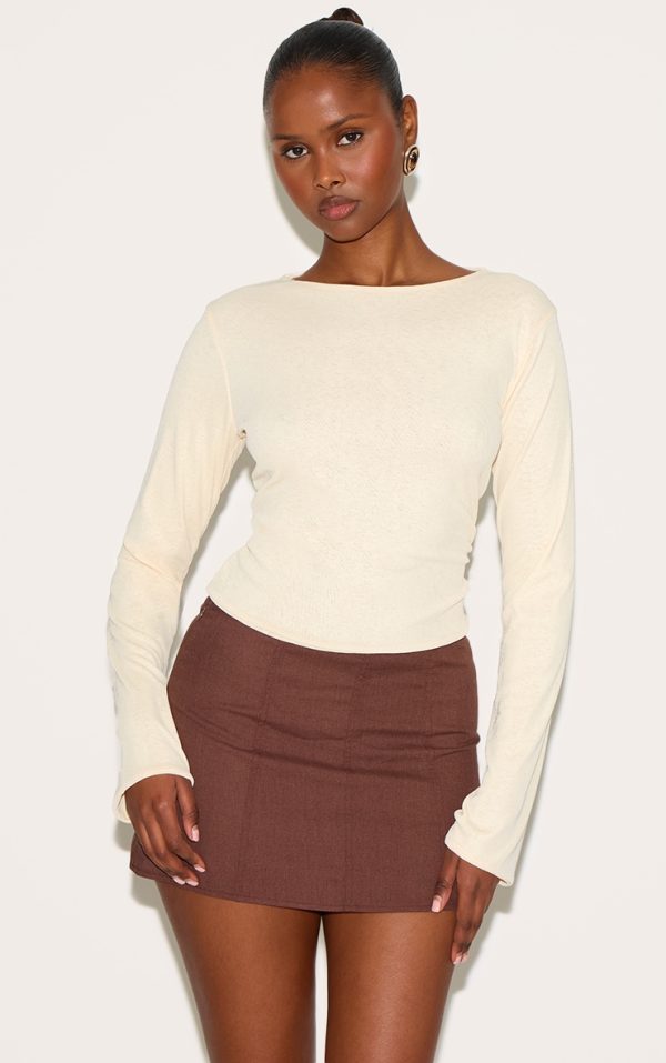 8834a20701cc44186a1d4f5e4a3c0dec9843ba31_CNM7976_1_almond_onion_skin_boatneck_flute_sleeve_long_top