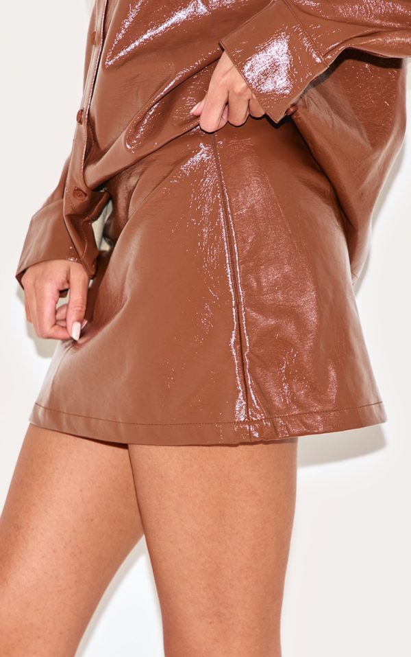 88b2a7c304422094fb439df3e06f87ead5387815_CNL6586_5_chocolate_faux_leather_mini_skirt