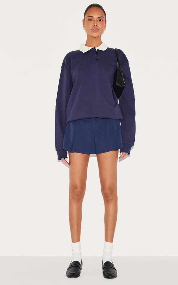 88f702b39d0c690210ead9c38c16ea7bb31793a9_CNM2343_1_navy_tailored_woven_box_pleated_skater_skort