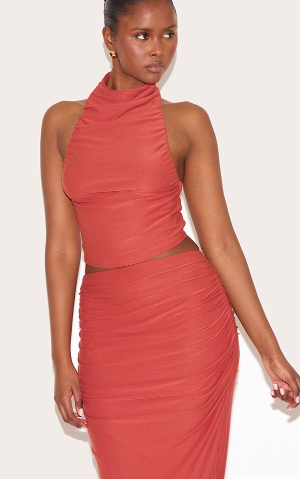 8996941d197caa817d73fe349f0419317aa11458_CNN0617_4_rust_soft_touch_ruched_halter_crop_top