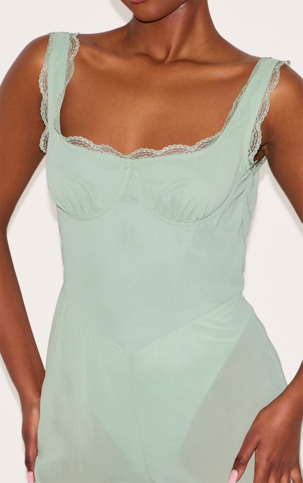 8aa29061d5fff288e72d53ddfcd262a689b87b6e_CNL9226_4_stone_floral_printed_chiffon_corset_detail_flared_jumpsuit