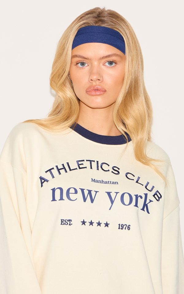 8ab12d0db95b56c56dc4567955aad8ae3e4a9885_CNM0209_4_cream_premium_contrast_neck_embroidered_sweatshirt