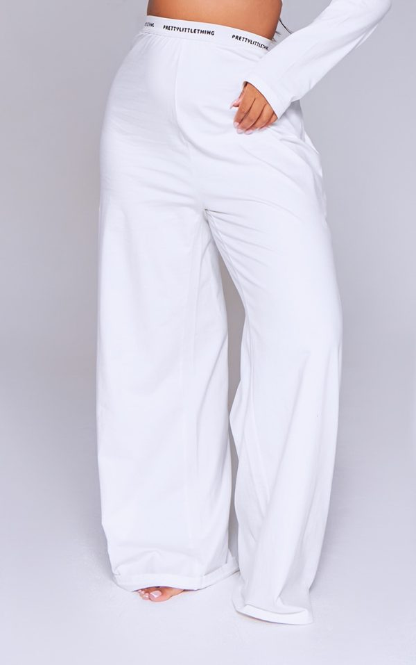 8ae232210ce2920c28a82dd95416525a5dbfaa3e_CNK2340_2_prettylittlething_tape_cream_pj_trouser-1
