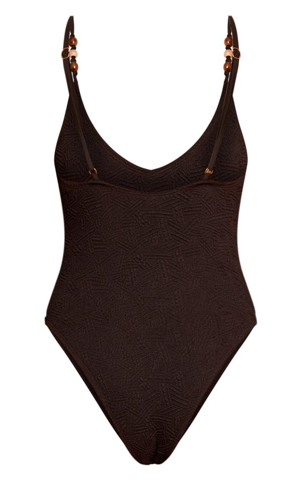8b1cd7599784eacaf37ba3af403f2065e167f54f_CNM6699_6_black_textured_bead_trim_plunge_swimsuit