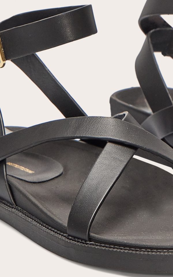 8b1db9ae452db0ec23fffe9b831c49bee59a78e8_CNL6601_4_black_pu_round_toe_gold_toe_loop_strappy_footbed_sandals