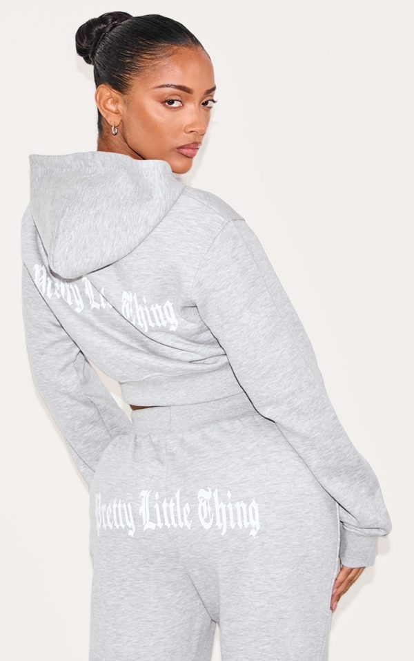8b3133236ac9022ee3a2d52ceb85915f465bb9d2_CNK5741_2_prettylittlething_shape_grey_marl_printed_back_cinched_waist_cropped_hoodie