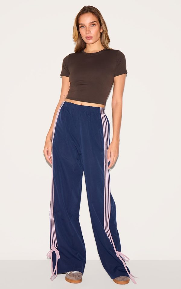 8b31c4e2807c37973918490a4b3029d970f9d865_CNK3664_1_navy_shell_bow_detail_track_pants