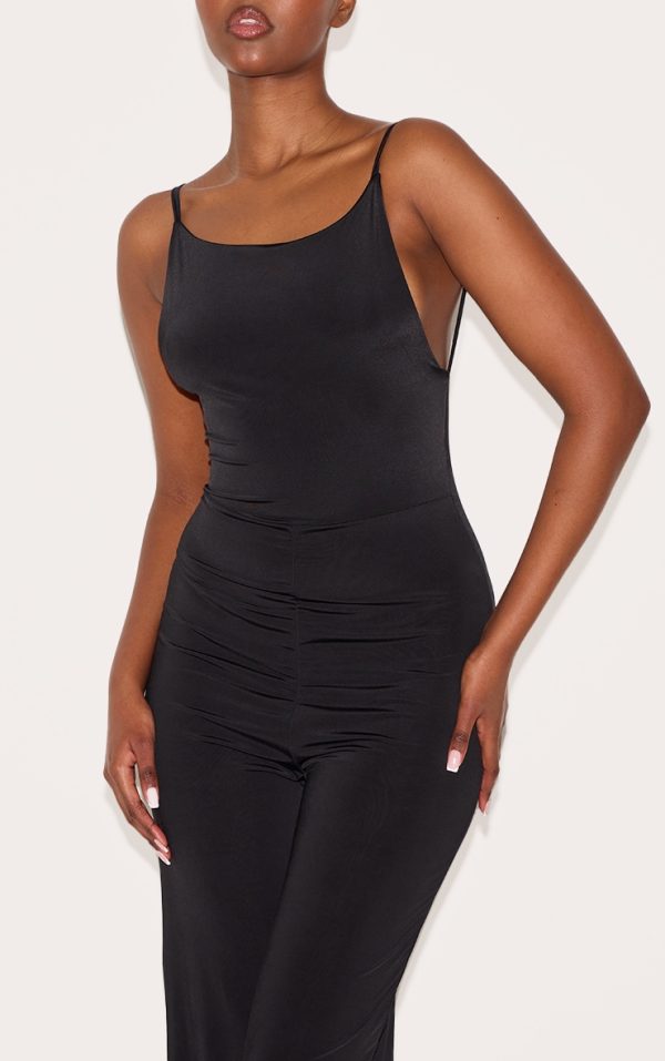 8b8a27e712cdee51fc2e4ba7aa04a2ef5f24da9f_CNM3115_4_black_double_layer_slinky_low_back_strappy_wide_leg_jumpsuit
