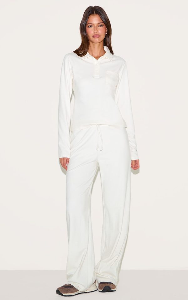 8bf1ed56419060ed03c6889b1192fa34d0384513_CNM6186_3_cream_long_sleeved_super_soft_v_neck_button_up_top
