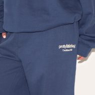 8c08000fbabdd3c7ac91fde89ec10a1275f1fb7d_CNK3386_4_prettylittlething_plus_navy_printed_premium_straight_leg_joggers