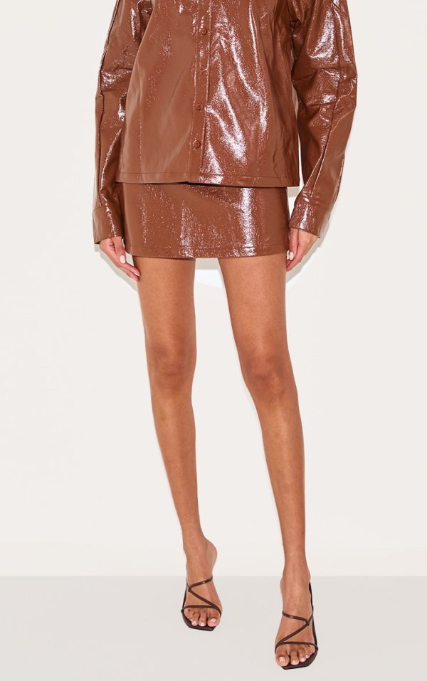 8c238925bc841fdeedded9685ce735aea21737bf_CNL6586_2_chocolate_faux_leather_mini_skirt