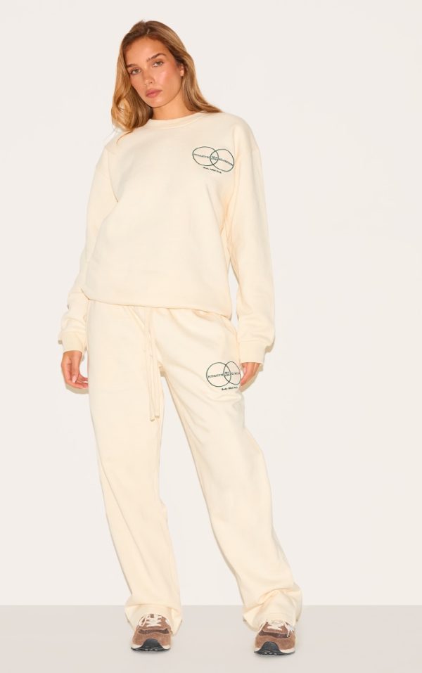 8c6e9adc152fc7da675b32360acc5f2683b436a9_CNL8276_3_cream_circle_wellness_premium_print_oversized_sweatshirt