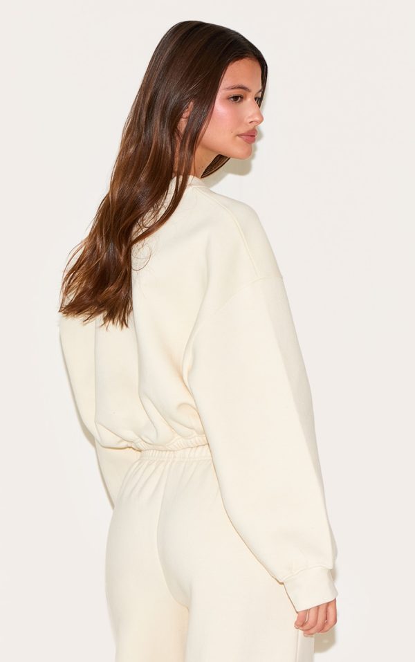8cc44861cb3b841edef06cfa57de85029efb175e_CNM7125_2_cream_drawcord_waist_cropped_zip_up_sweatshirt