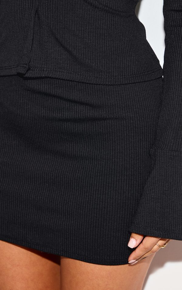 8d7f8511f0c89c0e90354d27877ae73029838299_CNL8390_5_petite_black_ribbed_high_waist_mini_skirt