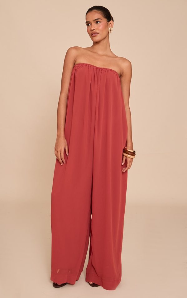 8e736f5bfddd51818e1429e5da325ca9d7017ceb_CNM7311_3_rust_chiffon_bandeau_puffball_jumpsuit