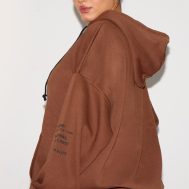 8e79a595f15fa81a551a65ff3acbc2a33490e60b_CNE5424_2_prettylittlething_plus_chocolate_oversized_fit_slogan_printed_hoodie
