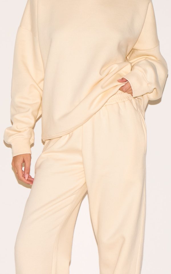 8ea540be27b42d5164663ae13b297b66f6fe3120_CNM8141_4_cream_oversized_sweat_tracksuit_set