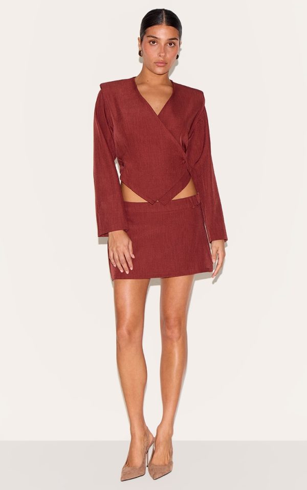 8ee396fc85723f39538a8599b8c215fa5a898ad8_CNM3510_3_petite_burnt_orange_woven_long_sleeve_asymmetric_button_top