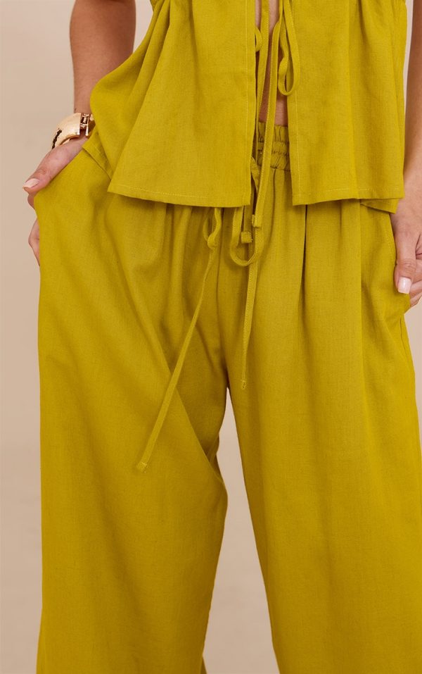 8f46964306693a195f8c795403255f3d71b18909_CNM8589_4_deep_mustard_linen_look_drawstring_wide_leg_trousers
