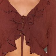 8f4b3f4b3c18ebe32f5ec3b92efc41e699269b83_CNM3968_4_petite_chocolate_cheesecloth_ruffle_tie_front_long_sleeve_top