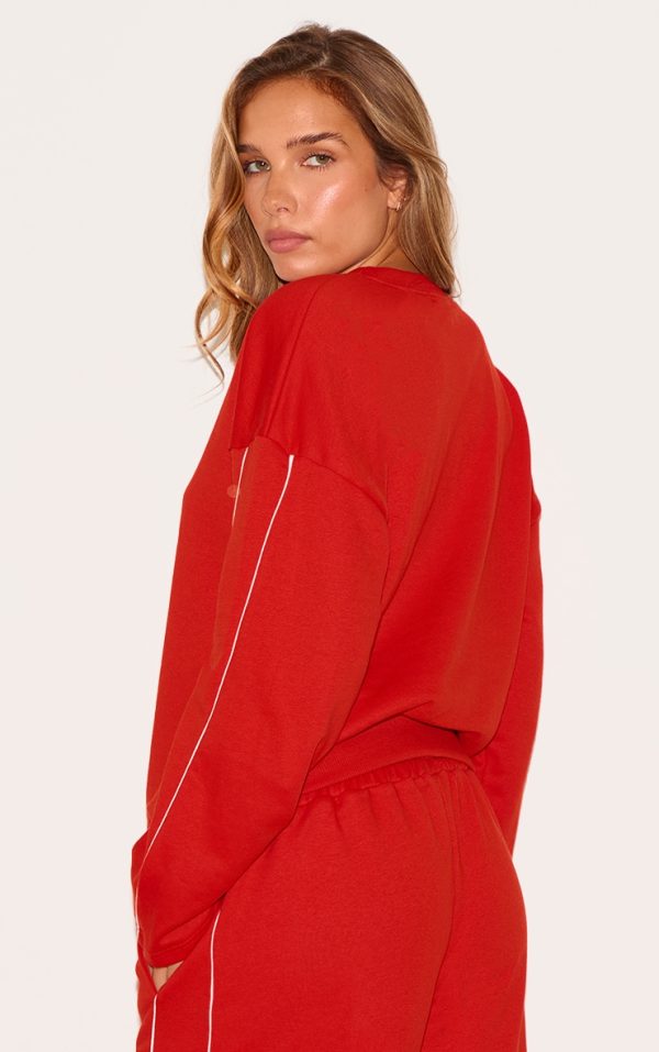 8f76650847db7e3ca2aed4dc1cf0dea6e551c3b4_CNL8650_2_red_contrast_piping_detail_sweatshirt