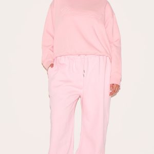 PRETTYLITTLETHING Plus Baby Pink Embossed Graphic Straight Leg Joggers