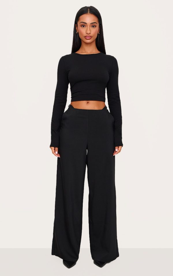 8fd80f1cc26d79b62eb5420db705d6d44d0d51a6_CNL5524_1_petite_black_low_rise_cut_out_buckle_detail_wide_leg_trousers