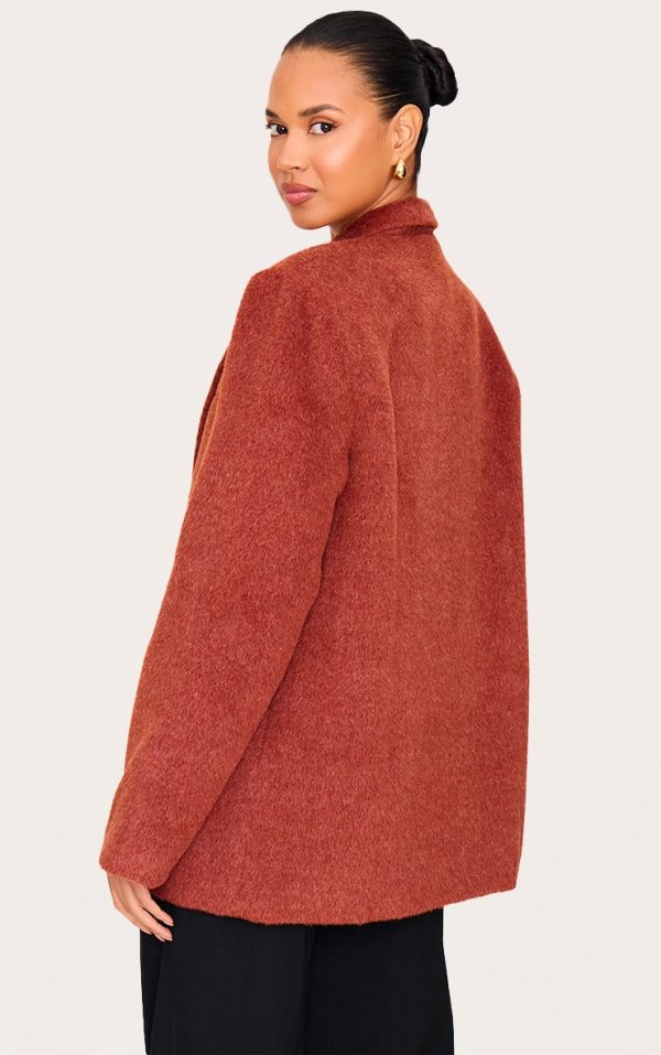 8fe8fe0cd97a7caf4f6cdcbb134df63ad73cb346_CNL6376_2_burnt_orange_oversized_textured_wool_look_blazer