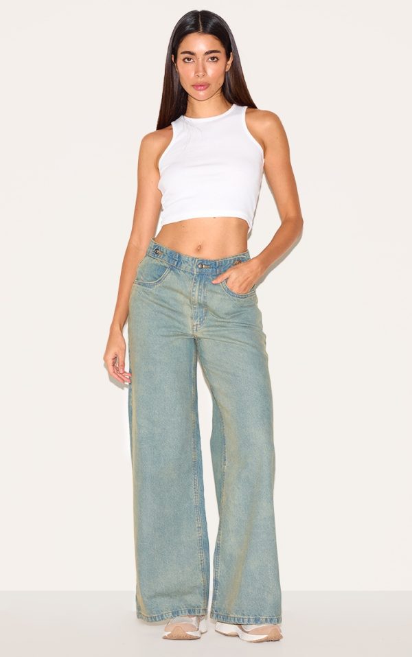 9029e2392da6c22aaa83e555d5c82f1cf78ee927_CNL6613_1_vintage_mid_rise_button_waistband_wide_leg_jeans