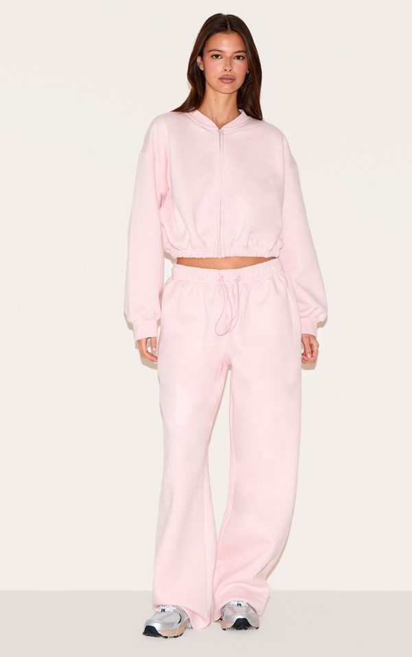 904856a594fcbdeda210b6e1899ea08ab489483c_CNM7126_3_baby_pink_drawcord_waist_cropped_zip_up_sweatshirt
