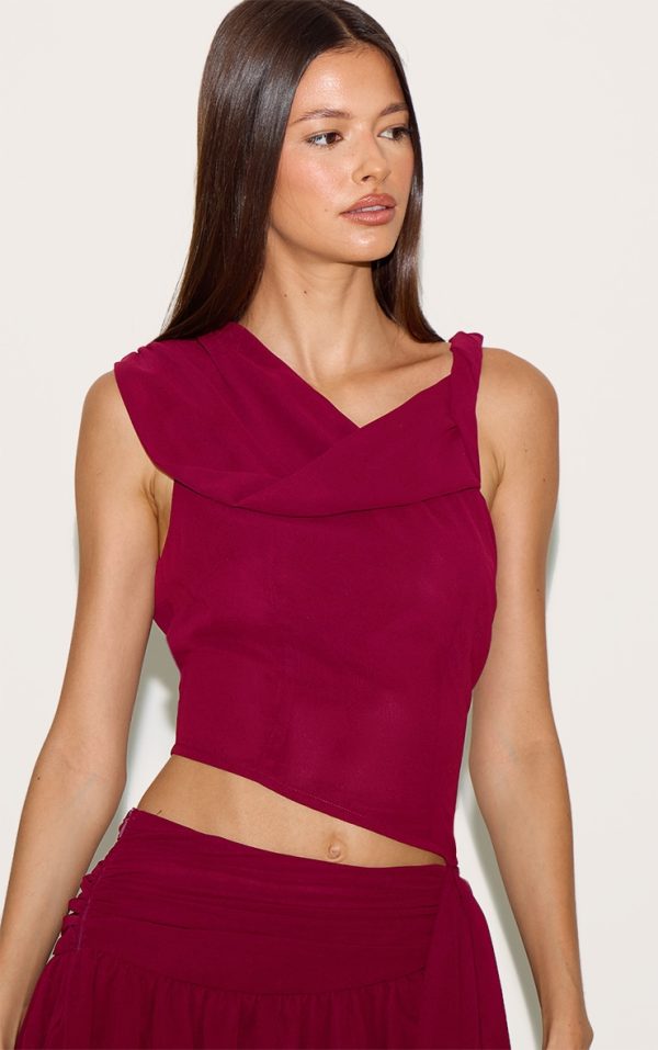 90a5654e2c7578a85bf36384082797a114c85026_CNM6167_4_wine_drape_detail_asymmetric_chiffon_top