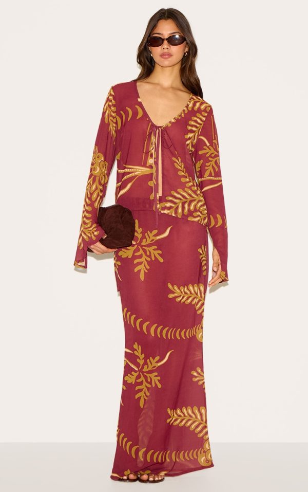 91688e2b79762335dfcc3b9ce3d7cddb24bdaff9_CNM6093_3_brown_sheer_floral_long_sleeve_tie_front_top